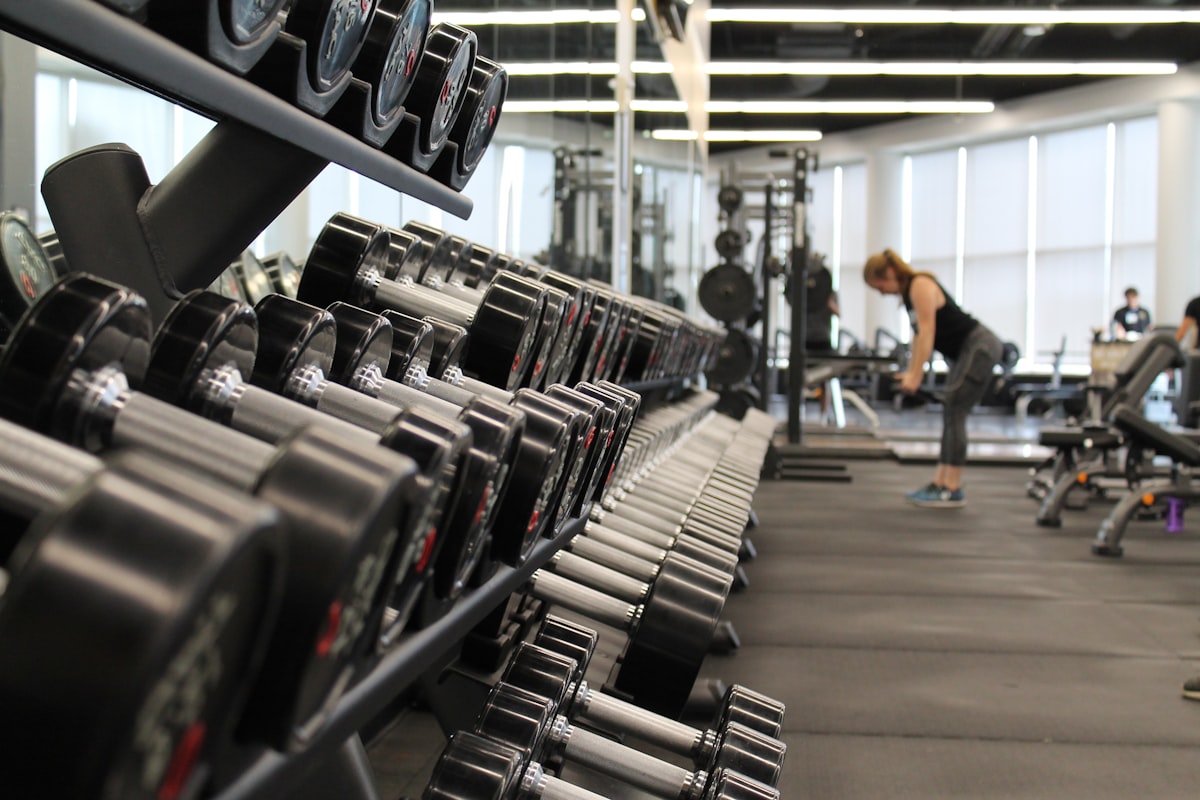 Woman lifting weights for strength and muscle health