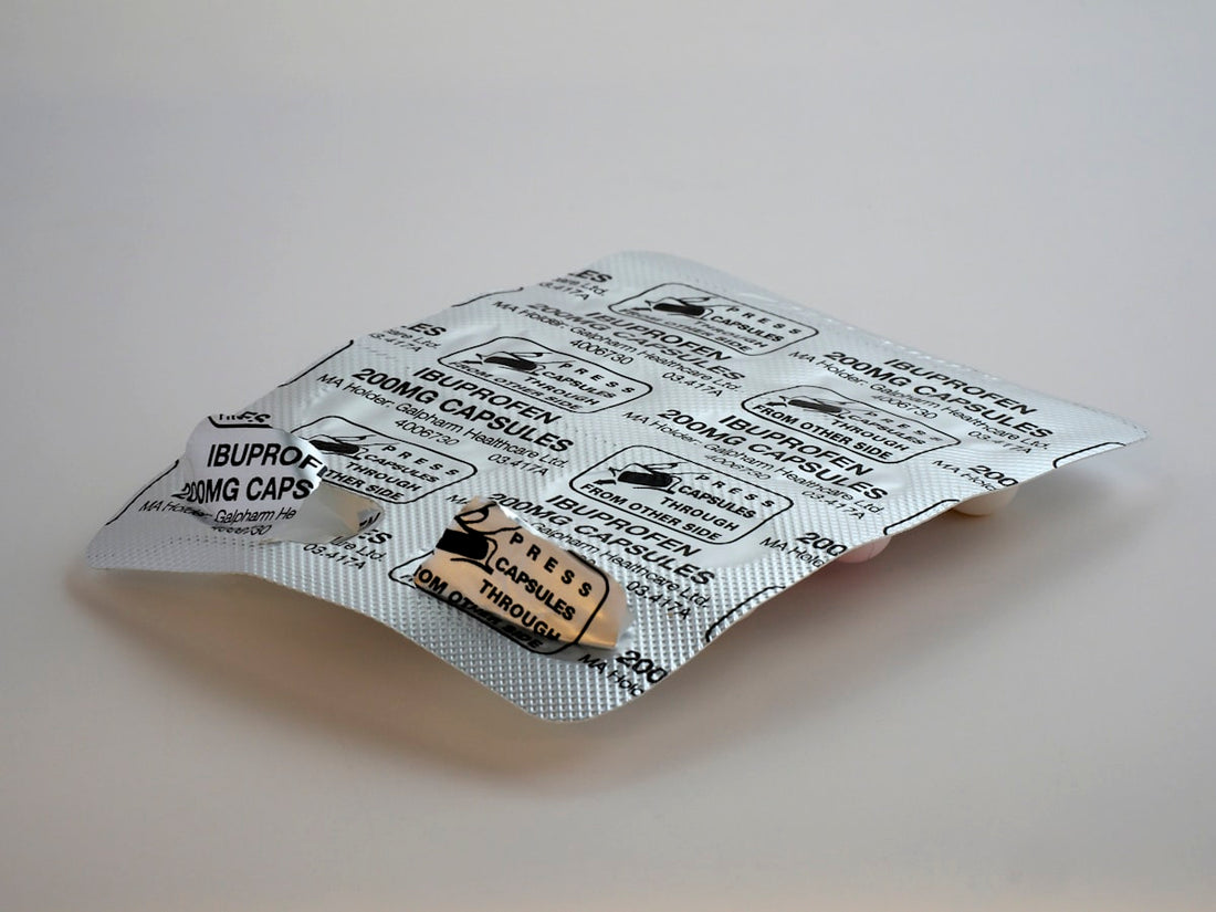 Magnesium supplement capsules in hand