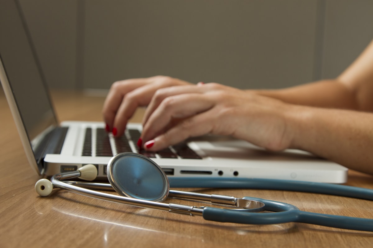 Woman in healthcare consultation discussing symptoms